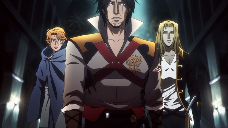 Animated characters blonde Alucard in black coat, Trevor with dark hair in front, and redhead Sypha in blue cloak in Castlevania