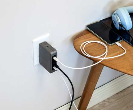 Charging multiple devices with the Satechi 145 USB-C 4-Port GaN Travel Charger.