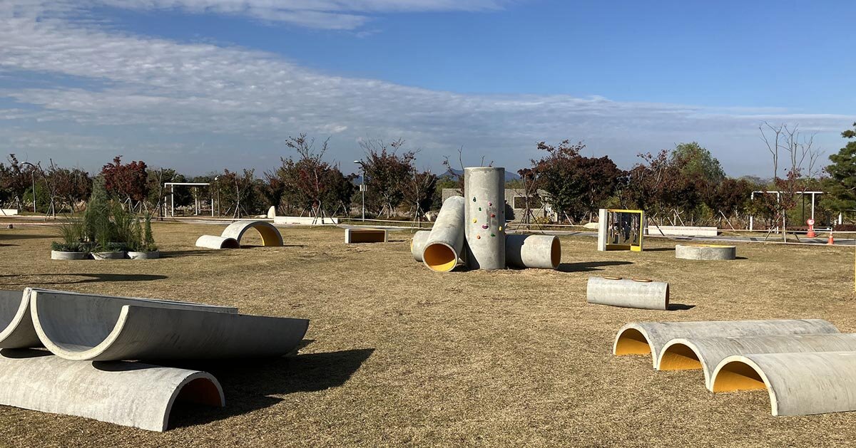 concrete utopia transforms discarded construction pipes into playground
