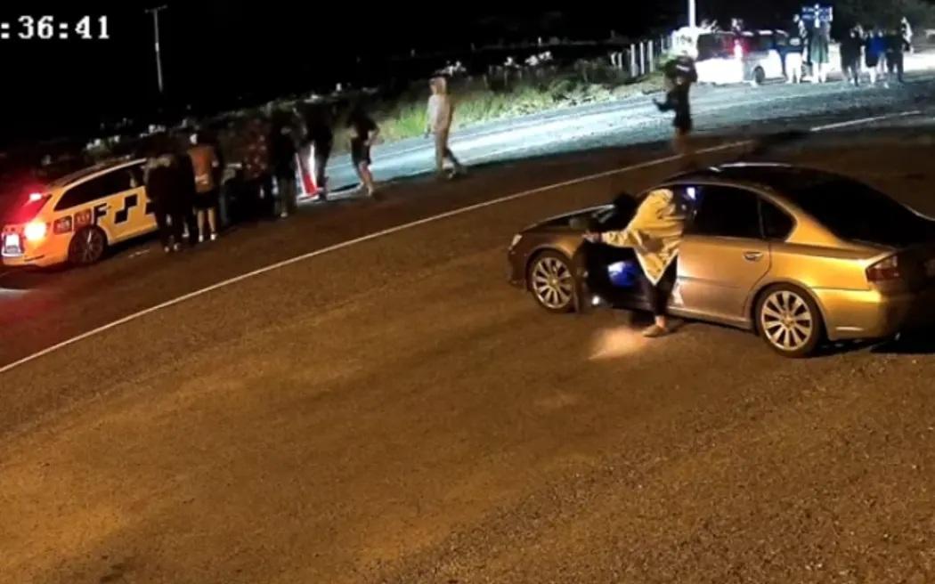 Charges laid after police retreat from 'hostile' group at car meet