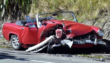 Tourist charged after classic car crash