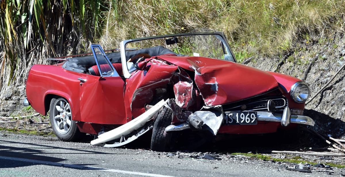 Tourist charged after classic car crash