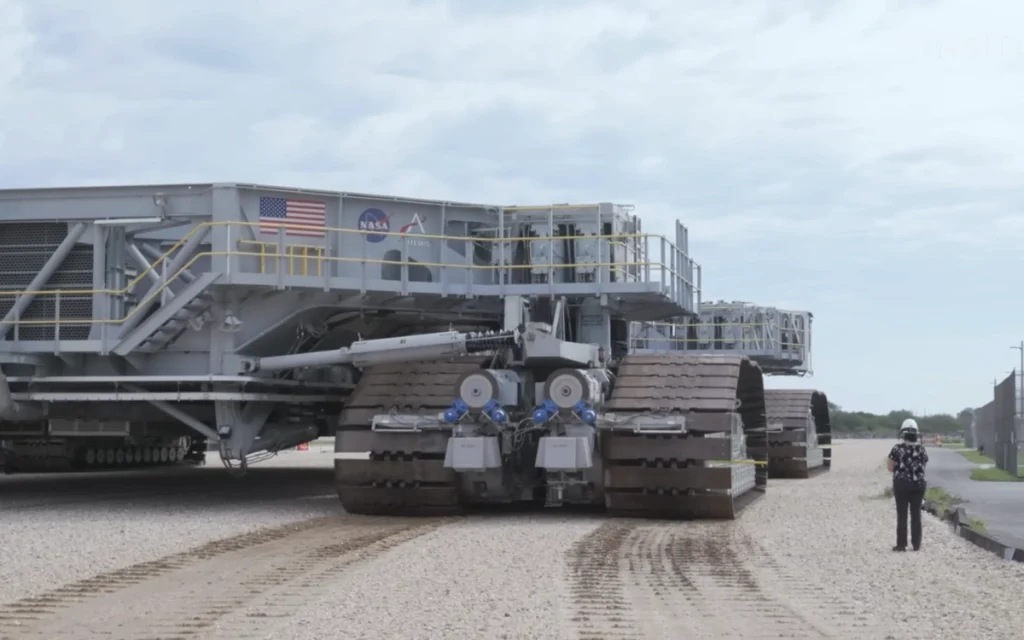 Before liftoff, NASA relies on its giant crawler-transporters to haul rocket ships on a journey that is slower than most people walk.
