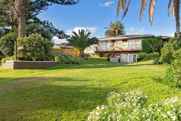 Contestants line up for Miss NZ 1965 at the Oceanbeach Road property. The pool’s gone, and the property is under contract. Photo / Supplied
