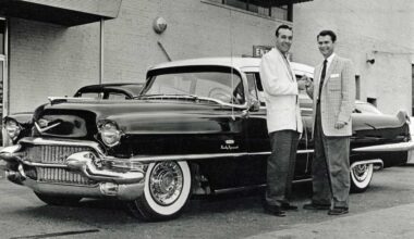 Sam Phillips presents Carl Perkins with a Cadillac outside Sun Studios