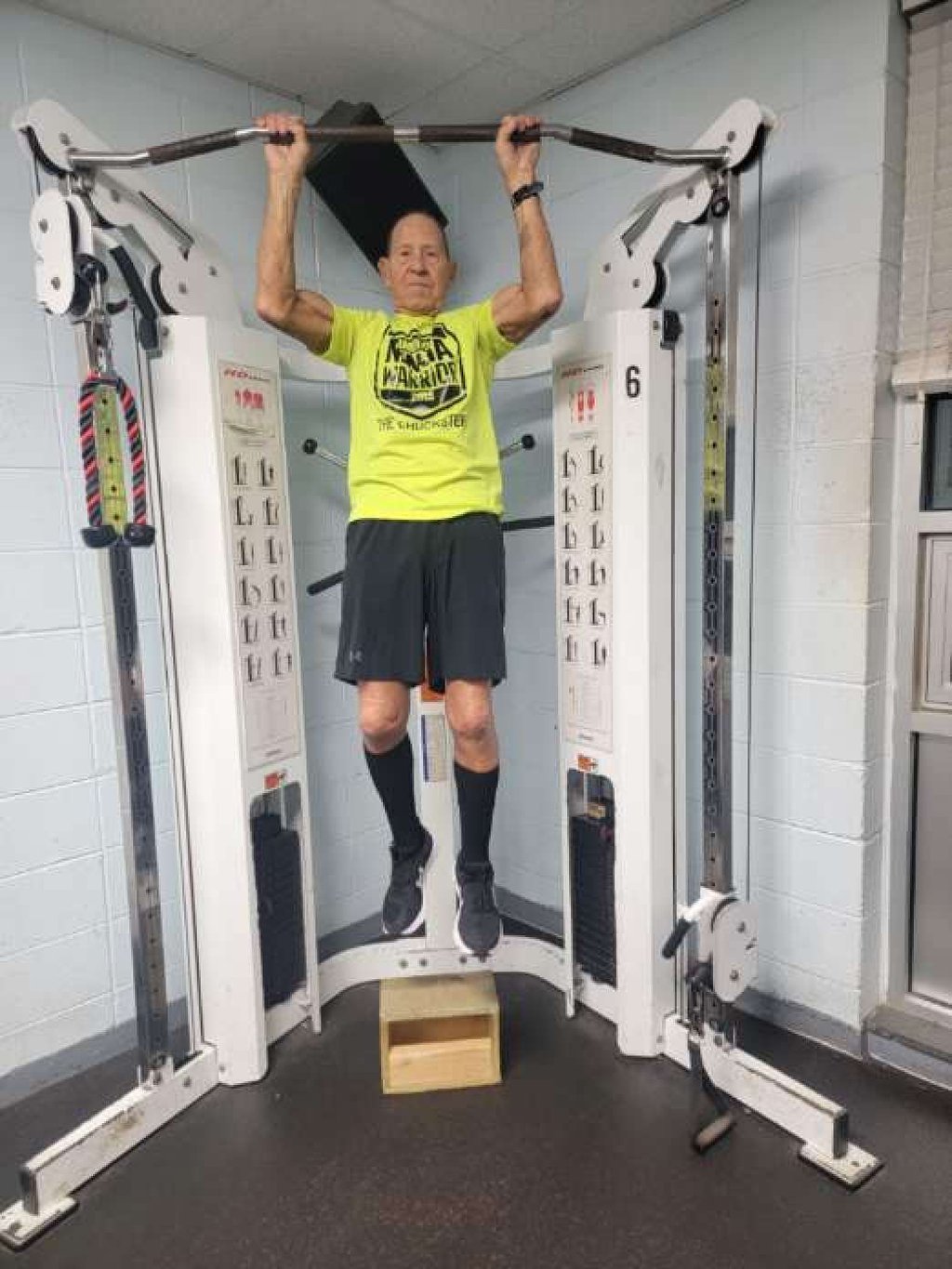 Mammay does pull-ups as part of this regular morning workout at the age of 83. Photo: Charles Mammay