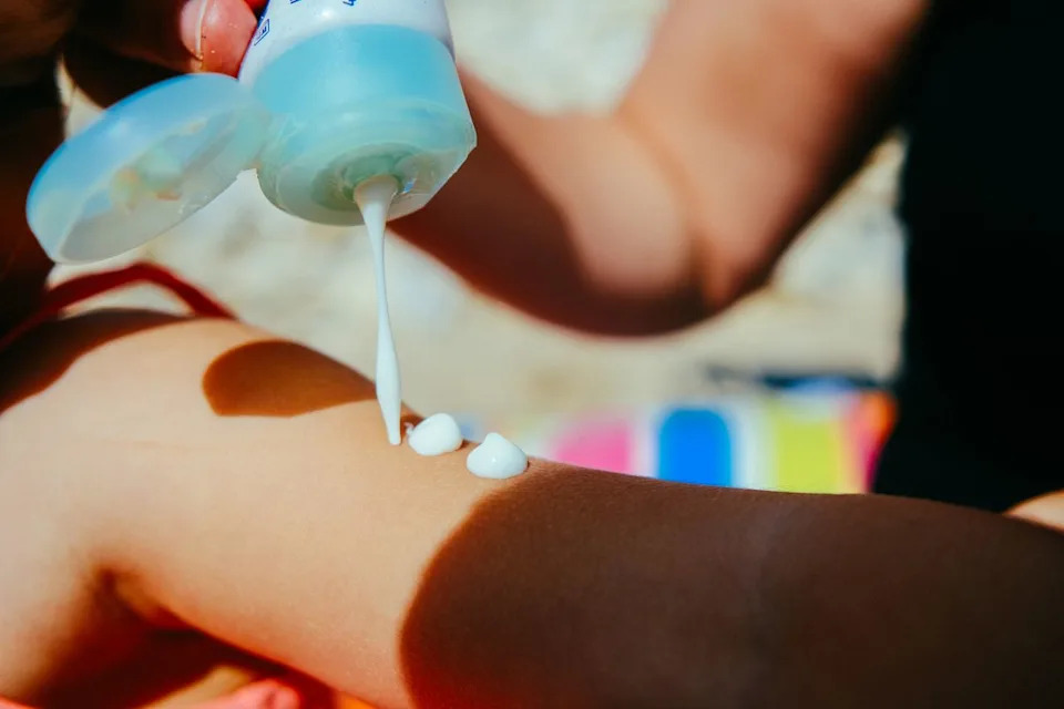 Stock photo of a person applying sunscreenCredit: Getty
