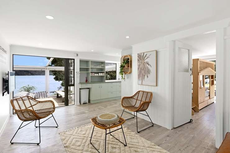 Kelly and Nathan Coe have listed their five-bedroom holiday escape at Te Kapa Inlet, in Mahurangi East. Photo / Supplied