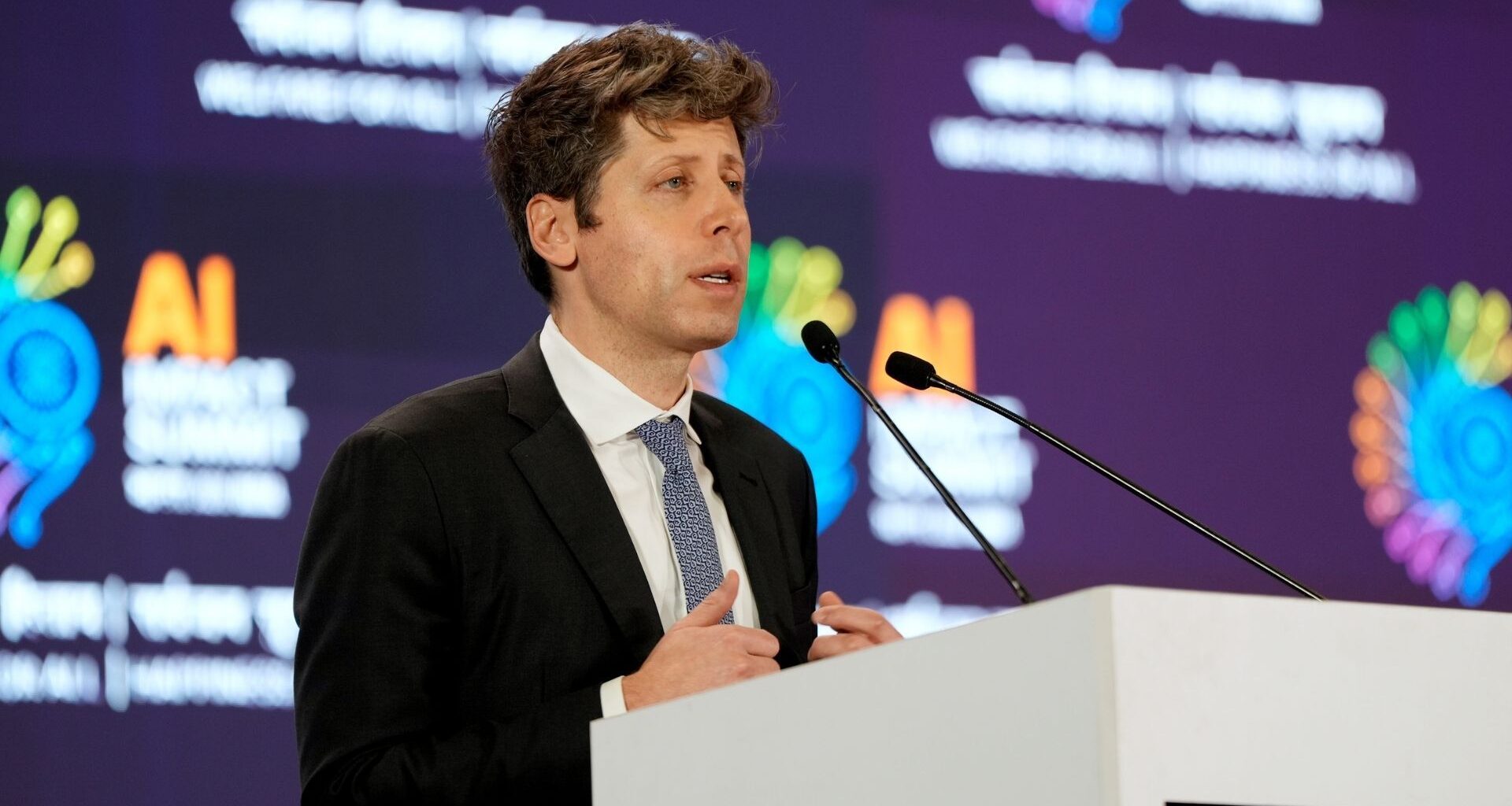 Sam Altman speaking at the India AI Impact Summit in February 2026