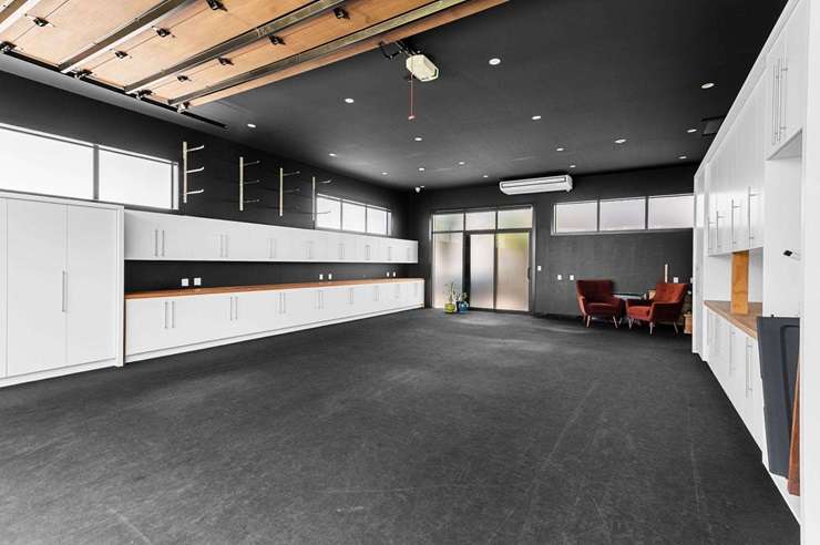 The black shed with a studio-style living area on Horsham Downs Road, Rototuna North, in Hamilton, sold to someone who plans to live in it as is. Photo / Supplied