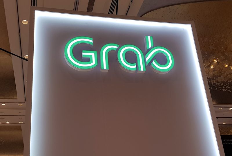 Singapore's Grab bets on AI, new services to triple profit by 2028
