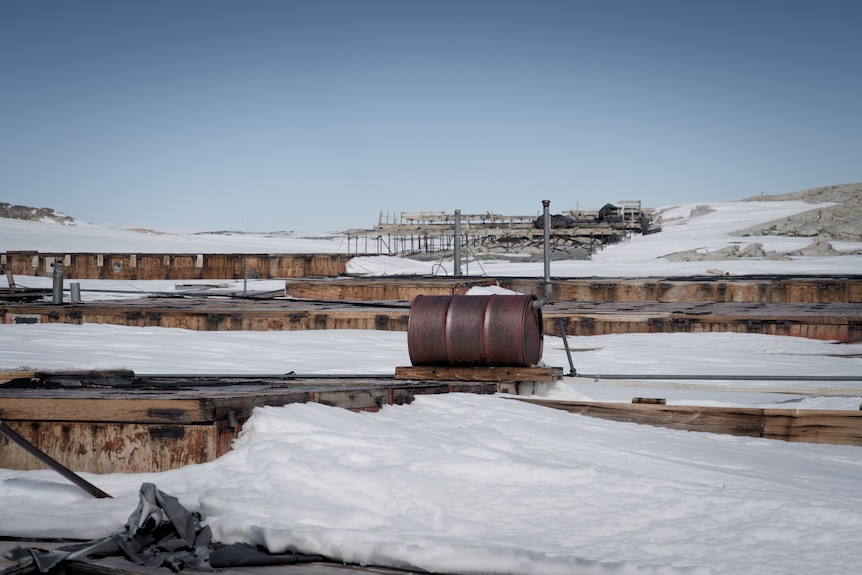 Rusty drum and structures at Antarctic environment.