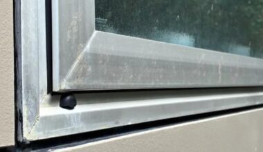 Wellington residents clean poo spray off houses after severe weather