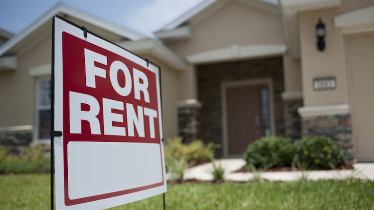 For Rent sign in front of new house