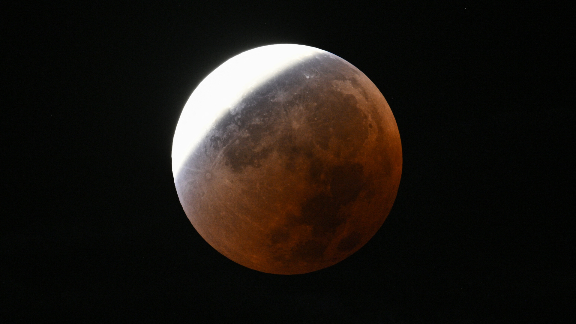 A full moon pictured during a total lunar eclipse.