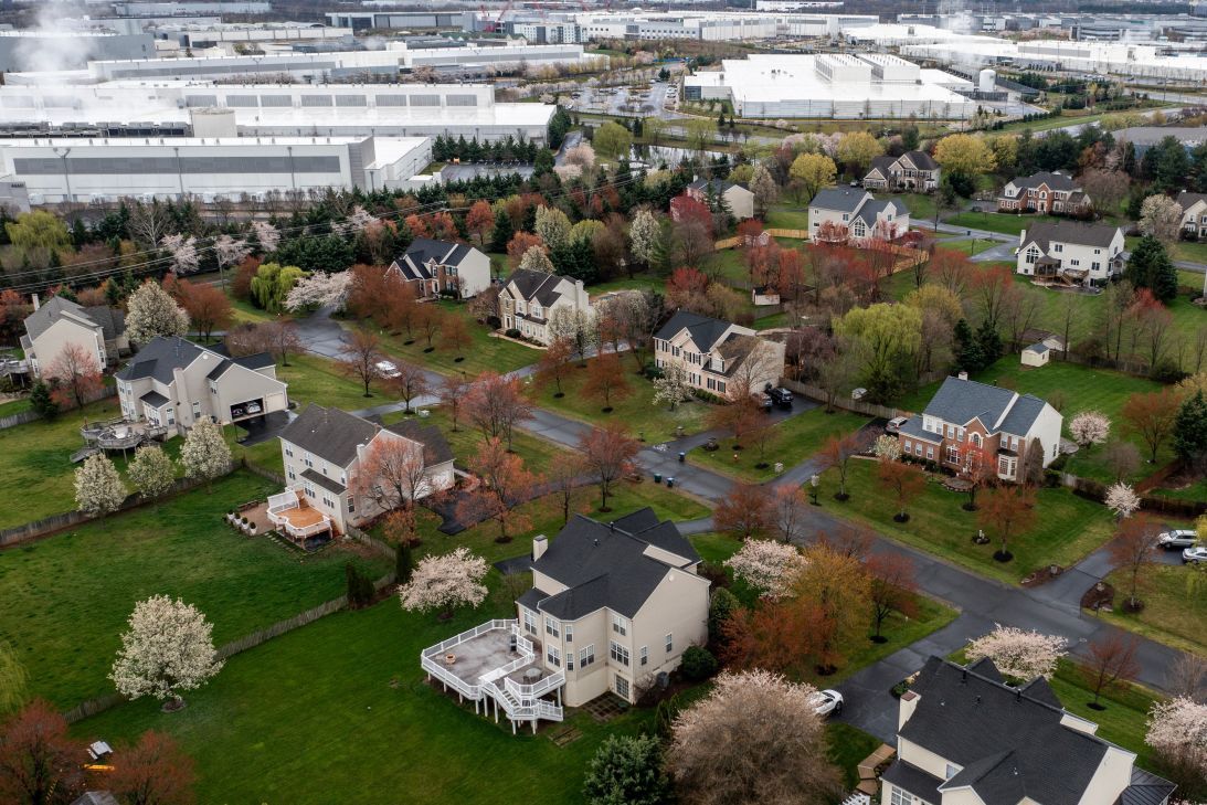 Data centers are seen near a housing development in Ashburn, Virginia.