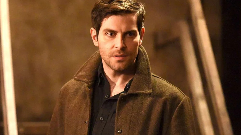 Nick wearing a brown coat in Grimm