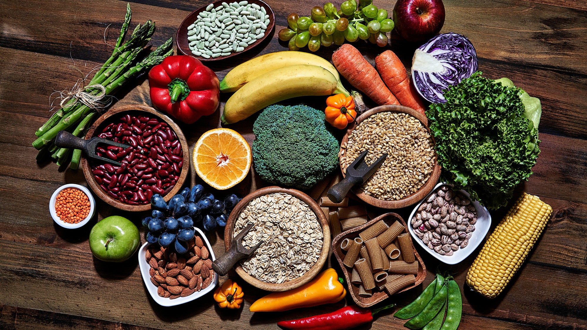 A variety of vegetables, fruits, and whole grain foods