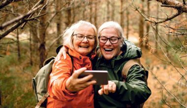 Two senior ladies hiking in the woods
