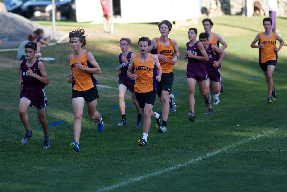 boys running in a crosscountry race