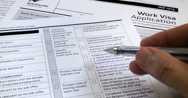 Home detention for ex-immigration adviser who faked jobs