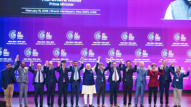 India's Prime Minister Narendra Modi, seventh left, poses for photographs with chief executive officers of various AI groups during the AI Summit in New Delhi, India, Thursday, February 19, 2026.
