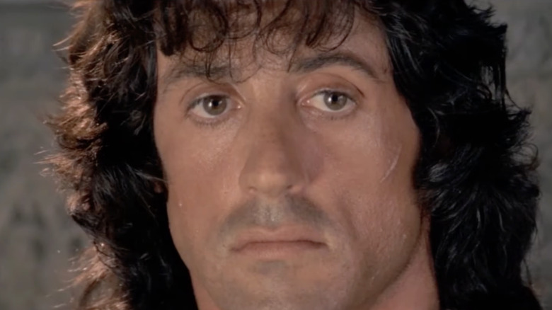 Sylvester Stallone sports a hangdog look as John Rambo in Rambo III
