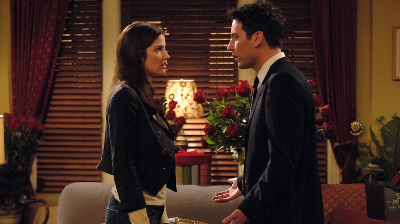 Robin and Ted talking in her living room in How I Met Your Mother
