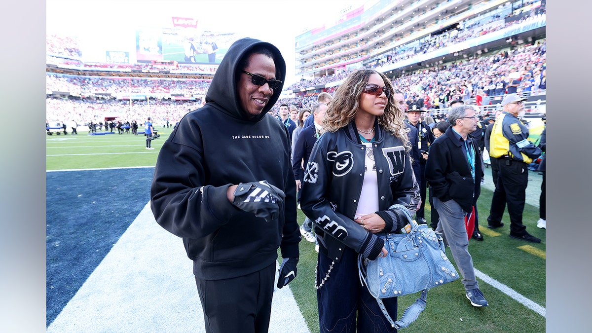 Jay-Z with his daughter at the Super Bowl.