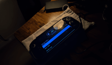 A Steam Deck in recovery mode, displaying options like Reboot system now, Apply update, and Factory reset on its screen.