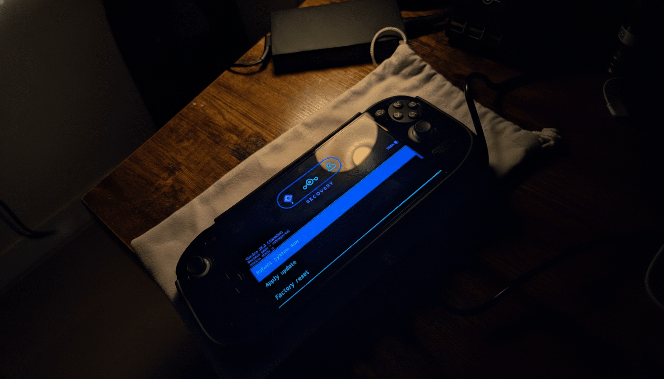 A Steam Deck in recovery mode, displaying options like Reboot system now, Apply update, and Factory reset on its screen.