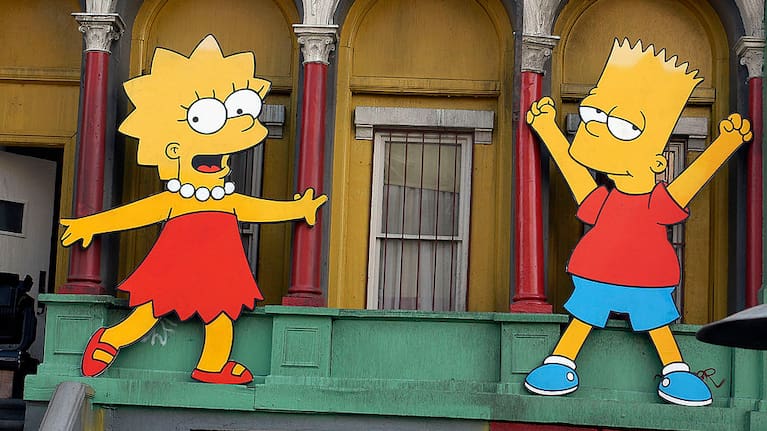 Lisa Simpson and Bart Simpson cut-outs on display