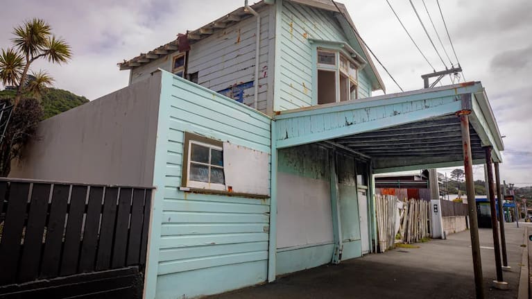 Lyall Bay resident Michelle is surprised the building survived the recent gales.