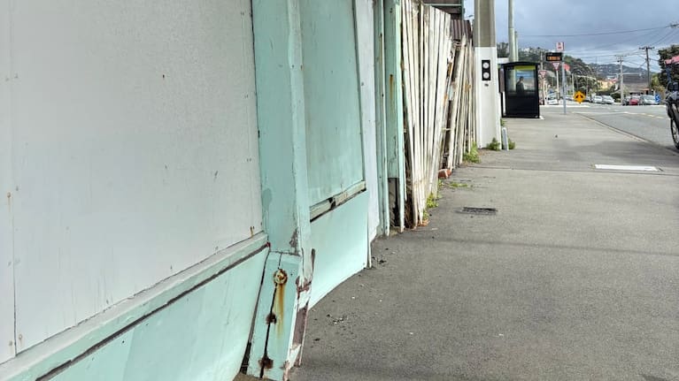 A pillar supporting the building’s veranda bulges towards the pavement.