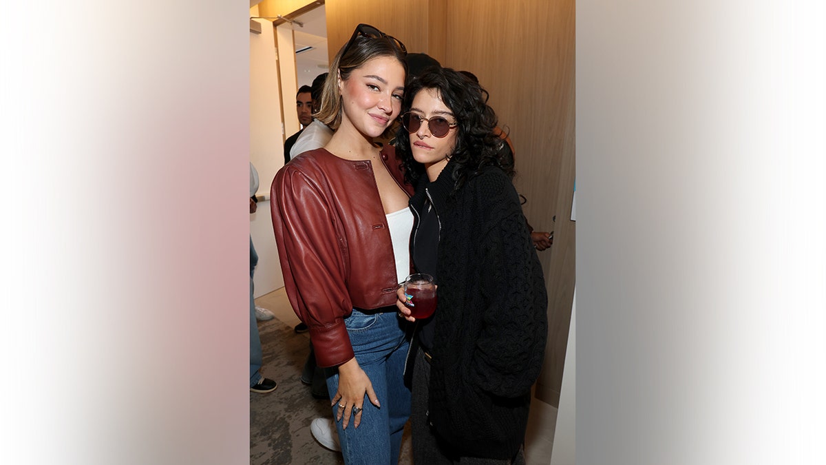 Madelyn Cline and Odessa A'zion ahead of the game at the stadium.