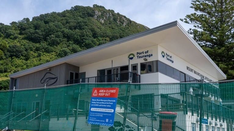 Mount Maunganui Surf Club remains under a red placard.