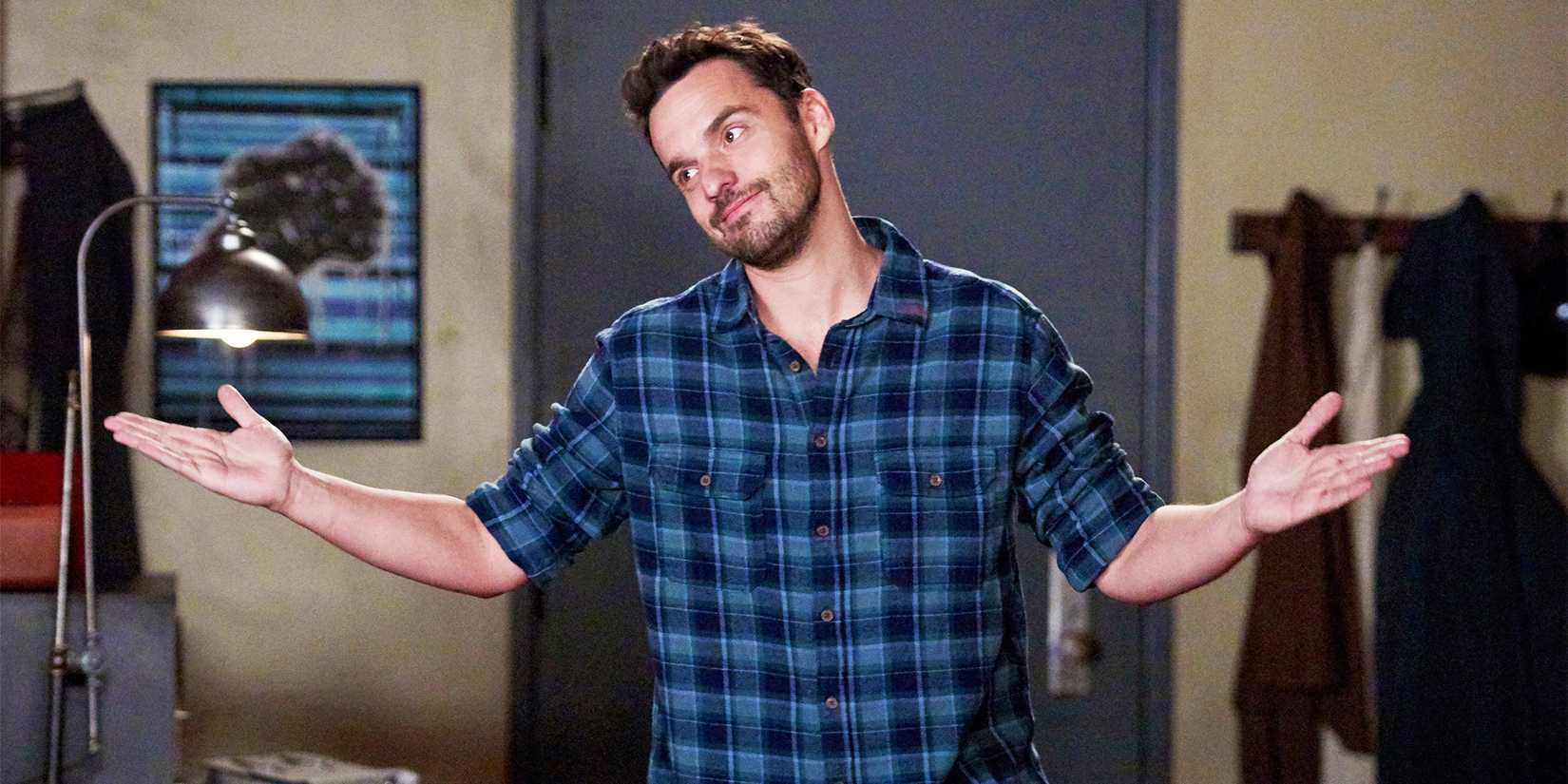 New Girl Jake Johnson as Nick Miller shrugging and smirking