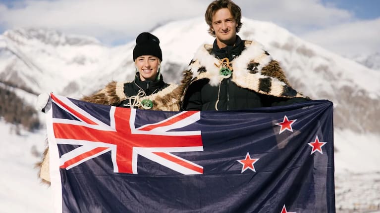 NZ Team Ngā Pou Hāpai (flag bearers) snowboarder Zoi Sadowski-Synnott (L) and freeski athlete Ben Barclay (R).
