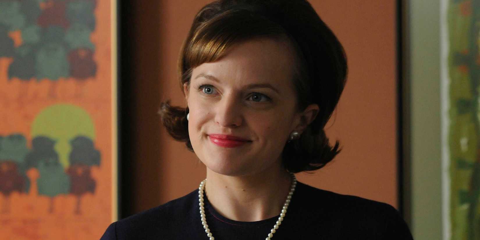 Peggy smiling in Mad Men