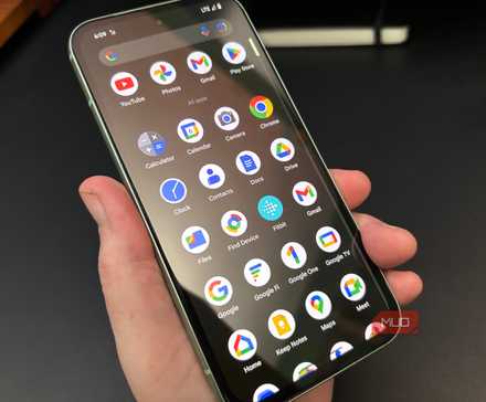 Person holding the Google Pixel 8a showing the apps menu