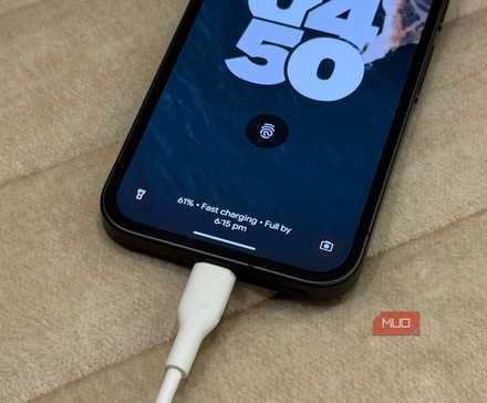 Pixel 9a fast charging on a white sofa