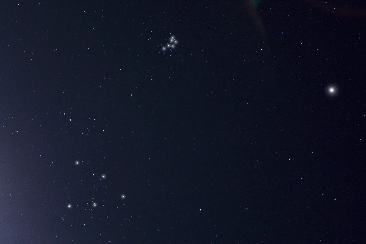 The Pleiades (top) and the Hyades star cluster (bottom left). Credit: Pete Lawrence