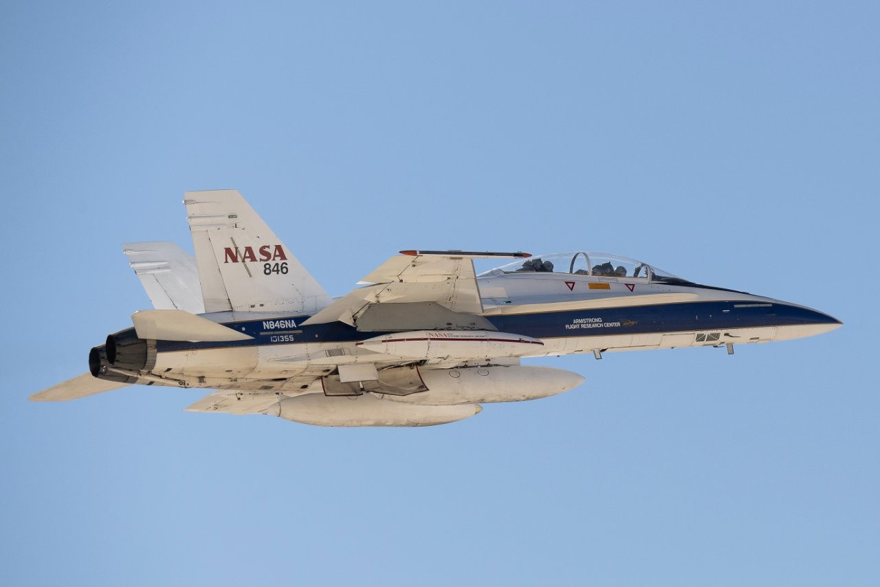 A NASA F/A-18 high-performance jet flies a mission.