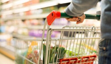 man pushing grocery cart