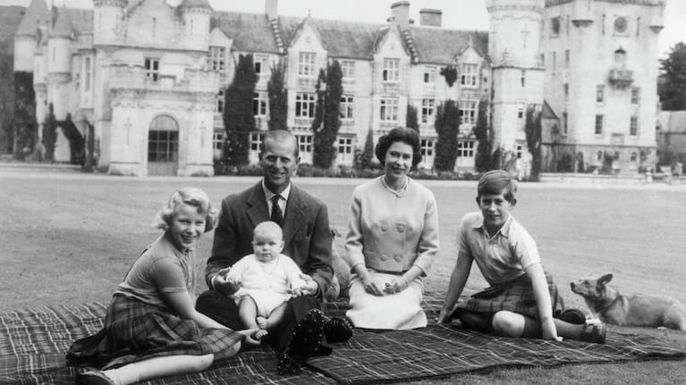 Queen Elizabeth II and Prince Philip, Duke of Edinburgh with their children, Prince Andrew (centre), Princess Anne (left) and Charles, Prince of Wales outside Balmoral Castle in Scotland in 1960.
