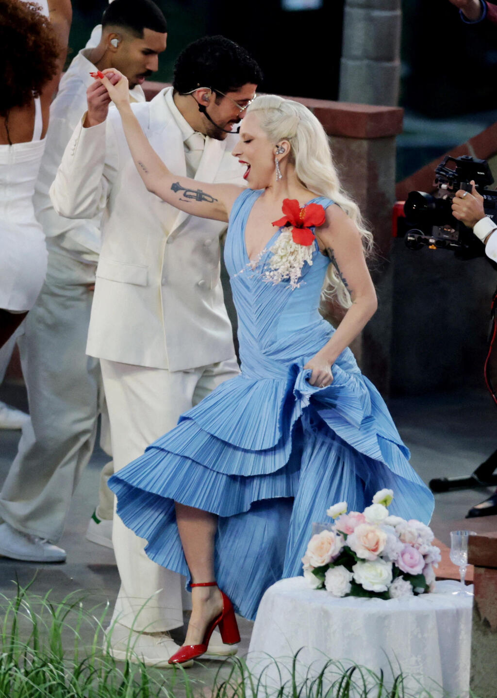 Lady Gaga in a dress by fashion house Luar joins Bad Bunny on stage (Photo: REUTERS/Jeenah Moon) באד באני וליידי גאגא בהופעה בסופרבול, 2026