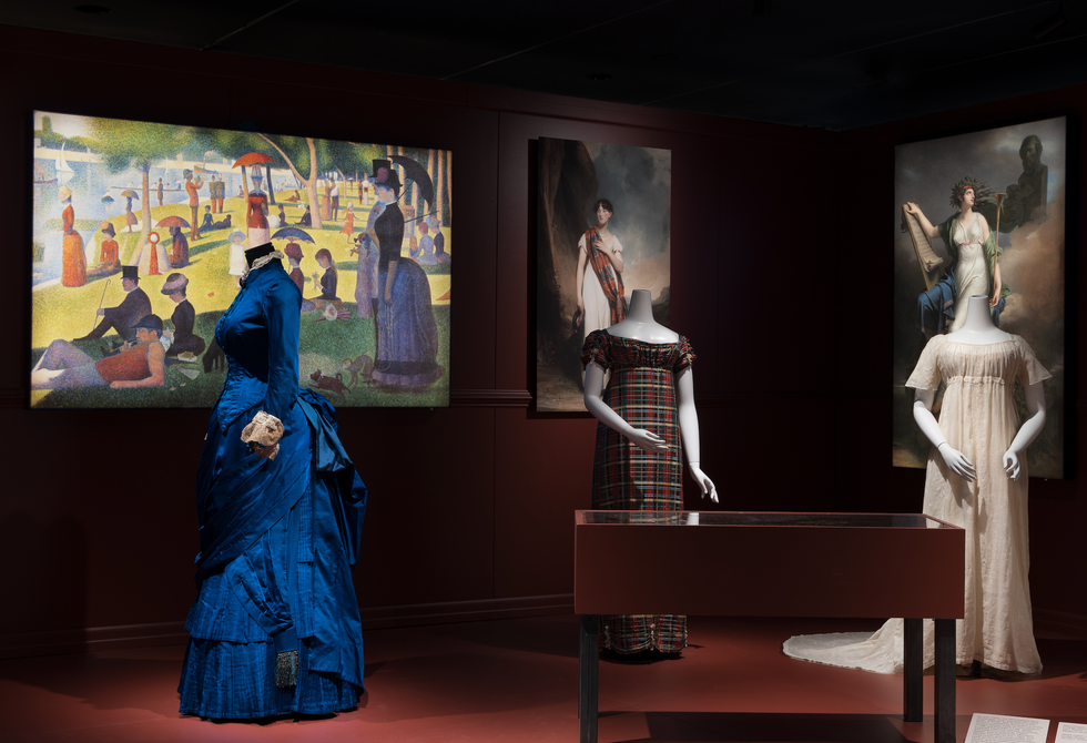 fashion exhibition featuring historical garments and artworks