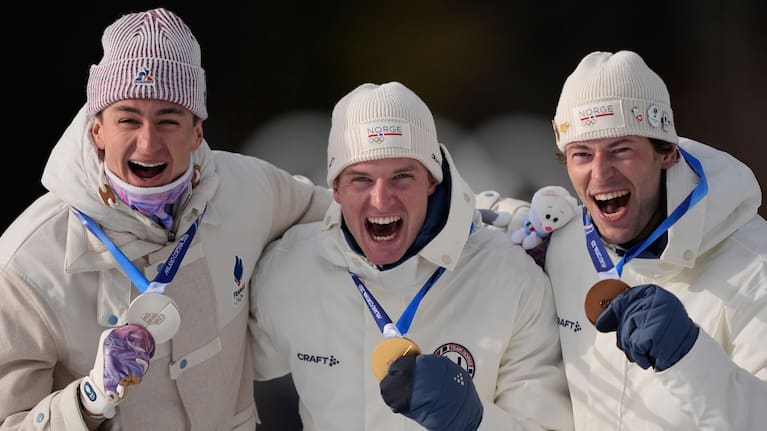 Silver medalist Eric Perrot, of France, from left, gold medalist Johan-Olav Botn, of Norway, and bronze medalist Sturla Holm Laegreid, of Norway.