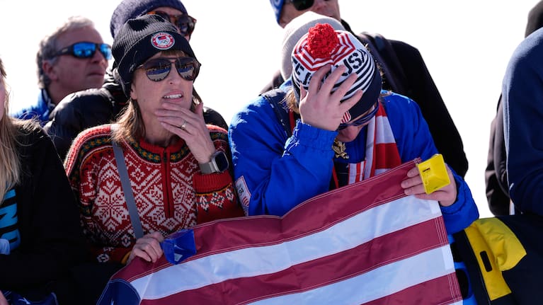 Spectators react after United States' Lindsey Vonn crashed during an alpine ski women's downhill race, at the 2026 Winter Olympics.