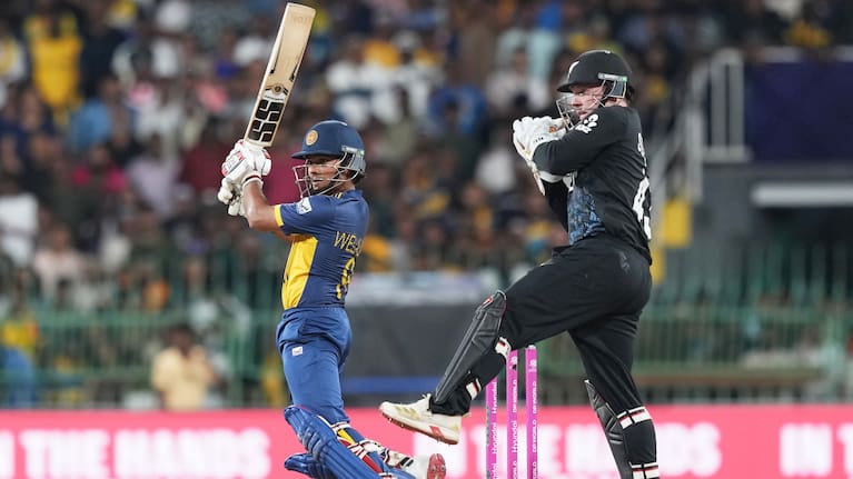 Sri Lanka's Dunith Wellalage plays a shot during the T20 World Cup cricket match between Sri Lanka and New Zealand in Colombo, Sri Lanka.